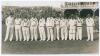 H.D.G. Leveson-Gower’s XI v M.C.C. Australian Touring Team 1936. Original mono photograph of the M.C.C. touring team to Australia lined up in one row at Scarborough, wearing cricket attire. Players’ names annotated in pencil to verso are Farnes, Holmes, W