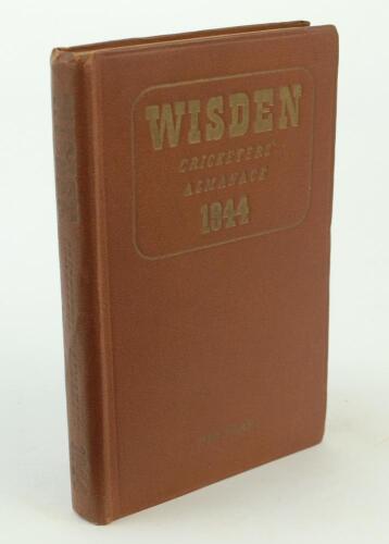 Wisden Cricketers’ Almanack 1944. 81st edition. Original hardback. Only 1500 hardback copies were printed in this war year. Dulled gilt titles on spine paper, dulling to gilt titles on the front board, general wear to boards otherwise in good condition. A