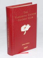 Yorkshire C.C.C. Annual 2007. Leather bound edition with gilt to all page edges. Front board with gilt titles and club emblem. Limited edition no. 106/150, signed by Darren Gough, captain. VG