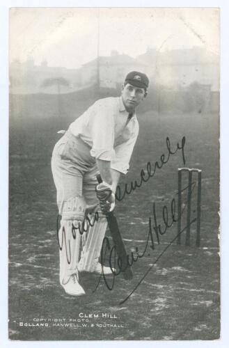 Clement Hill. South Australia & Australia 1892-1923. Original mono printed postcard of Hill standing full length, wearing Australia cap and in batting pose at the wicket. Very nicely and boldly signed in black ink to the image by Hill. Published by T. Bo