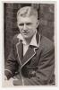 Benjamin Arthur ‘Ben’ Barnett. Victoria & Australia 1929-1947. Mono real photograph postcard of Barnett, half length wearing his Australian blazer, sitting on a bench during a match at Scarborough in 1934. Signed in blue ink by Barnett. Wilkes plainback p