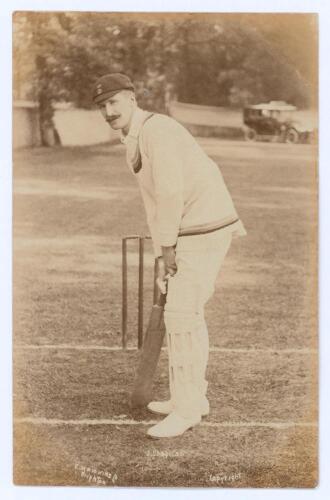 John Chapman. Derbyshire 1909-1920. Sepia real photograph postcard of Chapman standing full length at the crease in batting pose, wearing Derbyshire cap. E. Hawkins & Co., Brighton. Postally unused. Slight mount indentations to corners, otherwise in very 