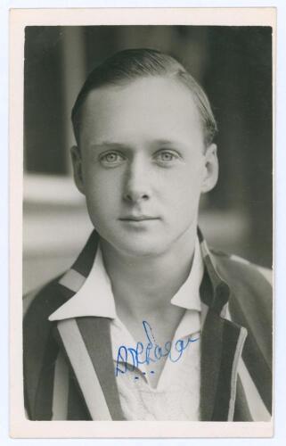 Edward Desmond Russell Eagar. Gloucestershire, Oxford University & Hampshire 1935-1957. Mono real photograph plain back postcard of Eagar, head and shoulders, wearing striped blazer. Nicely signed in blue ink by Eagar to the photograph. Official stamp to 