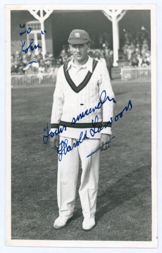 Harold Larwood. Nottinghamshire, Europeans & England 1924-1938. Original mono real photograph postcard of Larwood standing full length on the outfield at Scarborough, wearing cricket attire and cap. Nicely signed in blue ink to the photograph by Larwood w