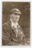 George Gunn. Nottinghamshire & England 1902-1922. Early sepia real photograph postcard of Gunn, half length wearing Nottinghamshire cap and blazer. Very nicely signed in black ink to the photograph by Gunn. The signature with a protective coating applied.