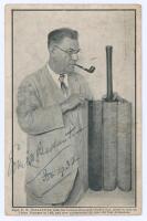 E.W. Ballantyne, South African sports journalist. Mono postcard with Ballantyne depicted three quarter length with pipe in mouth, holding a split and hinged bat. Printed caption below, &lsquo;Capt. E.W. Ballantyne with his famous six-paged Cricket Bat, given to