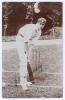 Frank Edward Woolley. Kent & England 1906-1938. Original mono real photograph postcard of a youthful Woolley, standing full length at the wicket in batting pose wearing Kent cap. Nicely signed in ink to the photograph by Woolley. Foster of Brighton, c.191