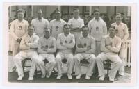Hampshire C.C.C. 1938. Original mono real photograph postcard of the Hampshire team seated and standing in rows wearing cricket attire. Players&rsquo; names to typed label to verso include Paris (Captain), Creese, Pothecary, Boyes, Herman, Arnold, Walker, McCor