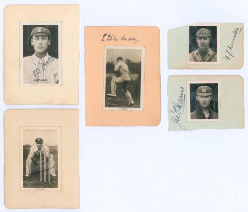 Signed cigarette cards early 1900s. Five mono real photograph cigarette cards, each individually laid to small album page. Two are signed in ink to the photographs by Surrey & England players, Jack Hobbs and Herbert Strudwick, three signed to the album pa