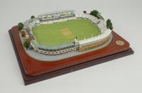 ‘Lord’s Cricket Ground’ by Alan Mynall. Large and detailed scale model of the ground, showing stands scoreboards pavilion media centre pitch etc. Produced by Danbury Mint in 1998. Authorised by M.C.C. With fitted perspex lid as issued. Approx 12.5”x10.5”.