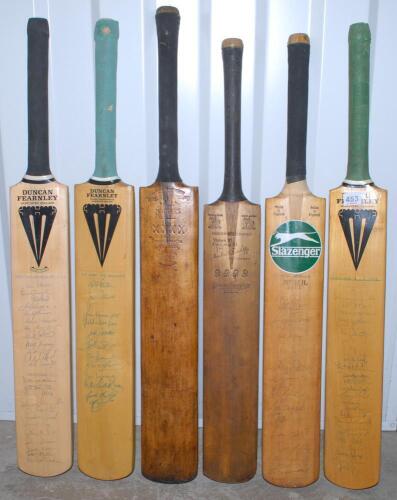 Cricket bats. Four signed bats, a Duncan Fearnley cricket bat signed by the Lancashire and Nottinghamshire teams circa 1989, twenty four signatures, a Duncan Fearnley bat signed by the Lancashire playing staff of 1993 with twenty eight signatures, A Slaze