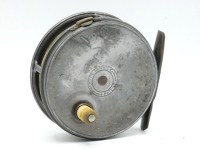 A Hardy Perfect 3 3/8" trout fly reel, ivorine handle, brass foot (filed), strapped rim tension screw, relocated to left hand conversion, 1906 calliper spring check mechanism, nickel silver drum locking screw, faceplate stamped circular logo, used conditi