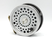 A Hardy Marquis No.2 salmon fly reel, ebonite handle, ribbed brass foot, two screw drum latch, rear tension adjuster, in zip case and a Hardy Graphite 3 piece salmon fly rod, 15'4", #10, in bag (2)