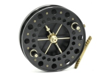 A fine Richard Carter Avon Classic 4 ½" narrow drummed centre pin reel, black anodised finish, caged and six spoked drum with twin composition handles, ventilated front flange, twin release regulator forks, ribbed brass stancheon foot with rear spear poin