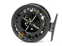 A scarce Richard Carter Firefly 3 3/8" trout fly reel, black anodised finish, shallow cored drum with counter-balanced composition handle and fork release lever, multi-perforated drum and backplate, pierced block foot engraved "No.14" and model details, r