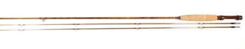 A fine Thomas & Thomas "Classic" 2 piece (2 tips) impregnated cane brook trout fly rod, 7', #3, mid-tan silk wraps, dark brown/crimson banded ferrule whippings, cigar shaped cork handle with polished black walnut seat and sliding blued nickel silver fitt