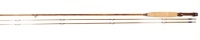 A fine Thomas & Thomas "Classic" 2 piece (2 tips) impregnated cane brook trout fly rod, 7', #3, mid-tan silk wraps, dark brown/crimson banded ferrule whippings, cigar shaped cork handle with polished black walnut seat and sliding blued nickel silver fitt