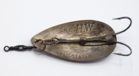 A rare The H.W. Patent Spring spoon bait, the 2" copper spoon body with silvered underside, stamped model detail and patent 8965, mounted double wire hook with two holding brackets and split ring eye, circa 1900