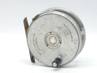 A scarce Hardy Perfect "spitfire" alloy 2 7/8" trout fly reel, ebonite handle, brass foot, milled rim tension screw and Mk.I check mechanism, interior stamped "J.S." (Jimmy Smith), light wear to finish from normal use, circa 1940