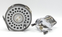 A Hardy St Andrew salmon fly reel, composition handle, ribbed alloy foot, two screw drum latch, milled rim tension screw and compensating check mechanism, twin screw nickel silver "U" shaped line guide, in zip case and a Hardy Elarex bait casting reel, ch
