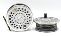 A Hardy Marquis No.2 salmon fly reel and spare spool, composition handle, ribbed brass foot, two screw drum latch and rear tension adjuster and a Sage Graphite IV 4 piece carbon salmon fly rod, 15', #10, alloy screw grip reel fitting, in bag (2)