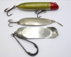 A Hardy Darting and Diving 6" big game lure, the green/red painted wooden body with one belly and one tail mounted treble hook and nickel silver loop eye, a Hardy Jim Vincent Broads Spoon 5" pike bait and a Hardy 6" Stewart Spoon big game spinning bait (3