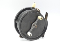 A good Bernard (Dingley made) Nova 4 ½" bait casting reel, caged drum with twin ivorine handles mounted on alloy cross-bar winding arm, brass bridge foot, cut-away rim section, rim mounted ivorine casting trigger and two further rim casting controls, int