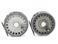 A scarce Hardy St John 3 7/8" trout fly reel, shallow cored drum with ebonite handle, and three screw drum latch, brass foot, milled rim tension screw and lighter trout Mk.II check mechanism and a standard Hardt St. John light salmon fly reel of similar