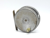 A scarce Hardy Perfect 2 7/8" trout fly reel, xylonite handle, brass foot, milled rim nickel silver tension screw and Mk.II check mechanism, wear from normal use, circa 1920