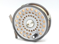 A Hardy Princess trout fly reel, composition handle, alloy foot, two screw drum latch, rim tension screw and compensating check mechanism, two screw nickel silver "U" shaped line guide and a Sharpe's "Eighty Eight" 2 piece cane trout fly rod, 8'8", #5/6, 