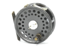A Hardy St George 3" trout fly reel, ebonite handle, ribbed brass foot, two screw drum latch, white agate line guide (no cracks), milled rim tension screw and Mk.II check mechanism, light wear to enamel finish, 1950's