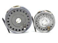 A Hardy St George 3" trout fly reel, , ebonite handle, ribbed brass foot, two screw drum latch, white agate line guide (no cracks), milled rim tension screw and Mk.II check mechanism, finish worn, in cream card box and a similar Hardy St George 3 ¾" trout