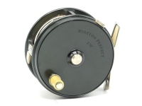 A good Winston Perfect 2 7/8" wide drummed trout fly reel, green anodised finish, ivorine handle, alloy foot, milled rim tension screw and dual compensating check mechanism, milled nickel silver drum locking screw, "U" shaped nickel silver line guide, as 