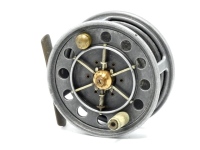 A rare Allcock Model Perfect 3" trout fly reel, based on the Aerial model with caged and six spoked drum, counter-balanced xylonite handle, ventilated front flange (ten holes), twin release/regulator forks, brass foot, rear sliding nickel silver optional