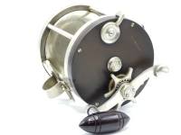 A rare Edward Vom Hofe Commander Ross 12/0 model 722 big game multiplier reel, ebonite and nickel silver construction, 2:1 ratio gearing, off-set counter-balanced bullet grip handle mounted above a six point capstan star drag, rim mounted drum release lev