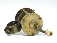 A rare Haywood brass clamp fitting multiplying winch, turned bone handle on off-set curved crank winding arm, rim mounted drum locking pin, triple cage pillars, riveted block foot with clamp fitting, perforated to take leather pad and with thumb locking s