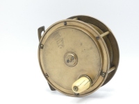 A Hardy Hercules 4 ½" brass salmon fly reel, domed bone handle, pierced and waisted bridge foot, quadruple cage pillars, fixed check mechanism, raised faceplate with two screw spindle boss and stamped Rod in Hand trademark and enclosed oval logo, overall