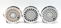 Three Hardy Marquis No.1 salmon fly reels, each with composition handle, polished alloy foot, two screw drum latch and rear tension regulator, nickel silver "U" shaped single screw line guide, all in lightly used condition, in zip cases (3)