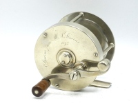 A rare early Edward Vom Hofe German Silver 4/0 multiplier reel, solid nickel silver construction, 2:1 ratio full bridged gearing, off-set serpentine counter-balanced ebonite crank handle, pierced off-set foot, triple cage pillars, hinged spindle oil port