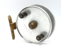 A Hardy Filey 4 ½" sea centre pin reel, solid alloy drum (no perforations), twin reverse tapered ebonite handles and milled brass spindle mounted tension nut, phosphor bronze bearings, brass stancheon foot, (reduced), stamped makers details, small corrosi