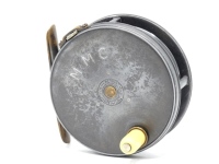 A Hardy Perfect 3 1/8" trout fly reel and block leather case, domed ivorine handle, pierced brass foot, strapped rim tension screw and late 1906 calliper spring check mechanism, contracted drum with four rim cusps and nickel silver locking screw, facepla