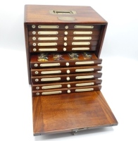 A fine and rare Hardy Unique Salmon fly reservoir, the rectangular polished mahogany case with fall front door, interior fitted ten sliding drawer each with ivorine bun handle, two ivorine index tablets, number disc and bars of nickel silver spring fly cl