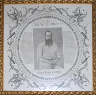 ‘W.G. Grace. Champion Cricketer of the World’. Large cotton handkerchief commemorating a Century of Centuries by Grace. The handkerchief has a central portrait of Grace three quarter length in cricket attire holding a cricket bat, with biography and recor