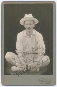 H.A. Laurie. New Jersey & Brooklyn Cricket Clubs 1891-1908. Mono cabinet card photograph of Laurie depicted seated cross legged on the ground wearing cricket attire and sun hat. Nicely signed in black ink to the photograph with dedication &lsquo;Yours very trul