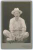 H.A. Laurie. New Jersey & Brooklyn Cricket Clubs 1891-1908. Mono cabinet card photograph of Laurie depicted seated cross legged on the ground wearing cricket attire and sun hat. Nicely signed in black ink to the photograph with dedication &lsquo;Yours very trul