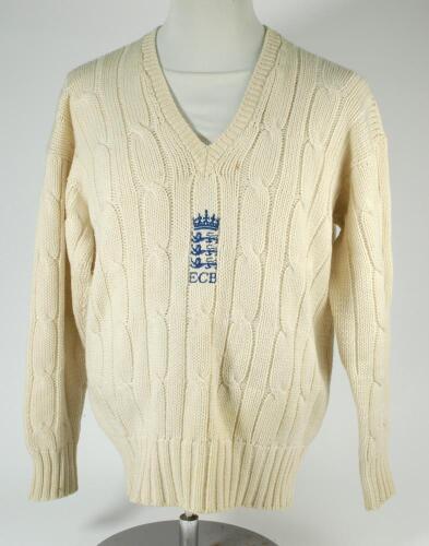 Kenneth Shuttleworth. Lancashire, Leicestershire & England 1964-1980. E.C.B. long sleeved sweater and blazer worn by Shuttleworth whilst officiating as an umpire in first class matches. The sweater, by BSB, with with central E.C.B. emblem of the three lio