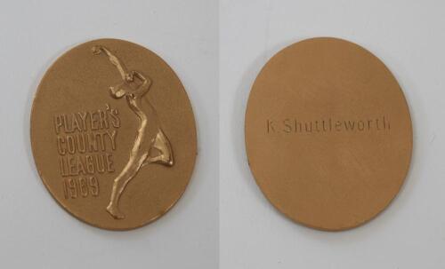 Kenneth Shuttleworth. Lancashire, Leicestershire & England 1964-1980. Player’s County League ‘Winners’ 1969. Bronze metal medal presented to Shuttleworth as a member of the Lancashire winning team. The medal with image of a bowler and title ‘Player’s Coun