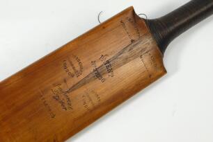 ‘A fine example of a Gradidge Imperial Driver’ 1912’. The back of the blade of the bat slowly rises until suddenly arching to its highest point creating an effect of humping before it then fall sharply to the toe. The handle formed from one cane is split 