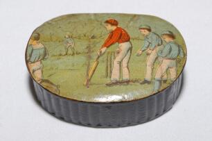 Cricket snuff box. A black lacquered papier mache oval snuff/pill box with hinged lid, believed to be circa 1870’s. The lid painted with a cricketing scene of boys playing cricket with trees in background. The box measures approx 2.75” x 2”x 1.25” deep. G