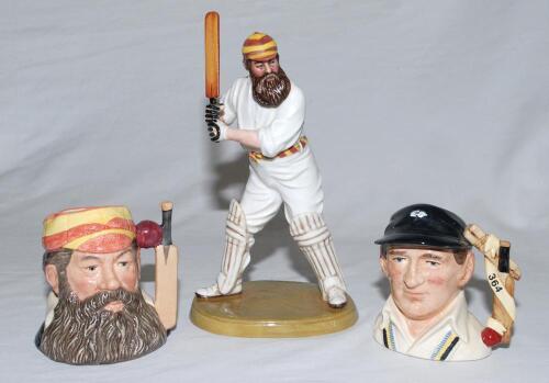 W.G. Grace. Royal Doulton china figure of W.G. Grace. Grace is depicted in batting mode wearing M.C.C. cap with bat raised about to drive. Approx. 9” tall. Limited edition no. 432/9500. Produced in 1995. Sold with a pair of Royal Doulton toby jugs of W.G.